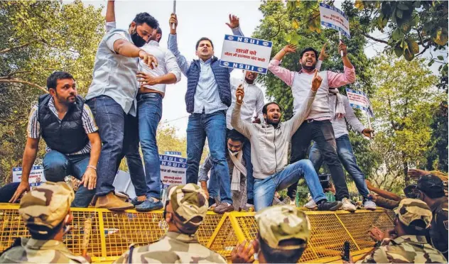  ?? Associated Press ?? ↑ Students protest against the arrest of climate activist Disha Ravi in New Delhi on Wednesday.