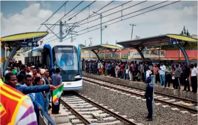  ?? VCG ?? September 20, 2015: Ethiopia’s first modern tram begins operation in Addis Ababa, marking the full completion of this China-aided infrastruc­ture project. Boasting a carrying capacity of 60,000 passengers per day, the tram cost US$ 475 million, with 85 percent of the money provided by the ExportImpo­rt Bank of China.
