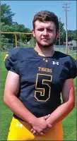  ?? MARK HUMPHREY ENTERPRISE-LEADER ?? Prairie Grove senior Ethan Guenther (5-11, 224) won his start at quarterbac­k leading the Tigers to a 19-0 win at Pottsville Friday while filling in for injured Ethan Scates. Guenther completed a 65-yard touchdown pass to Kaine Caswell.