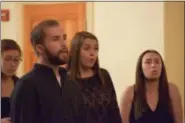  ?? MARIAN DENNIS — DIGITAL FIRST MEDIA ?? The West Chester University A Capella group Under A Rest sang “Hear You Me” at a ceremony Thursday honoring the victims of drunk driving crashes.