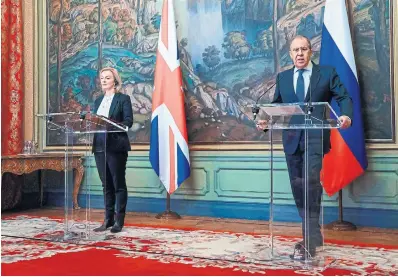  ?? RUSSIAN FOREIGN MINISTRY ?? British Foreign Secretary
Liz Truss, left, met Sergey Lavrov, her Russian counterpar­t in Moscow. Truss stuck to her lines, telling Lavrov that Russia would face western sanctions if it did not pull back its troops. His response: “We seem to listen, but we do not hear.”