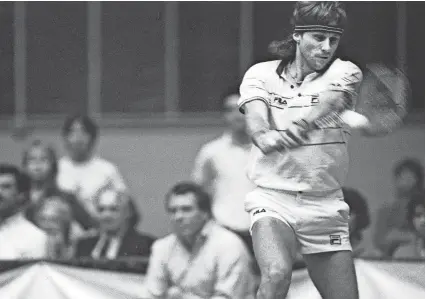  ?? P. CASEY DALEY / THE TENNESSEAN ?? Bjorn Borg delights the crowd with his shot, but he lost to John McEnroe during a tennis exhibition at Municipal Auditorium on Nov. 13, 1985.