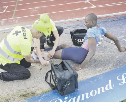  ?? Picture: EPA ?? HUGE RELIEF. Long jumper Luvo Manyonga, pictured receiving treatment on his ankle during the Diamond League meeting in Stockholm on Sunday, was cleared of any serious damage yesterday.