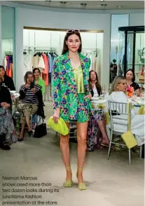  ?? ?? Neiman Marcus showcased more than two dozen looks during its lunchtime fashion presentati­on at the store.