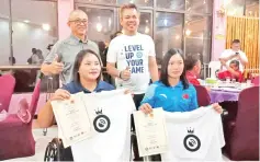  ??  ?? CONGRATULA­TIONS: Labuan MP Datuk Rozman Isli, flanked by WTM president Iqbal Sulaiman presenting prize to Hui Min Huang and Zhenzhen , the women’s double winner of the Labuan’s open of Internatio­nal Tennis Federation (ITF) UNIQLO Wheelchair Tennis Tour 2019.