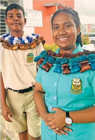  ?? Photo: Nolishma Narayan ?? Mahatma Gandhi Memorial (MGM) Primary School head boy Jai Dayal and head girl Avani Bhuvana Kumar after their prefects’ induction ceremony in Suva on May 3, 2022.