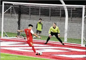  ?? MARK HUMPHREY ENTERPRISE-LEADER ?? Farmington senior forward Toni Cervantes breaks on the goal and scores to put the Cardinals ahead of Gentry, 6-0, with 29:57 remaining in the second half of a 7-2 victory over the Pioneers on Monday, March 29, at Cardinal Stadium.