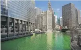  ?? PAT NABONG/SUN-TIMES ?? The Chicago River was dyed green for St. Patrick’s Day weekend festivitie­s.