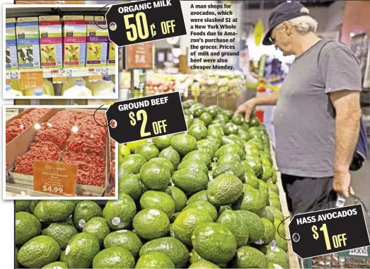  ??  ?? A man shops for avocados, which were slashed $1 at a New York Whole Foods due to Amazon’s purchase of the grocer. Prices of milk and ground beef were also cheaper Monday.