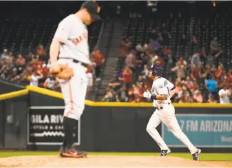  ?? Jennifer Stewart / Getty Images ?? Arizona’s A.J. Pollock rounds the bases on a solo home run in the sixth inning that sent Giants starter Ty Blach home with his third loss of the season. He has one win.