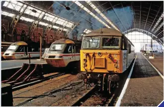  ?? PAUL BIGLAND. ?? 43096, 43119 and 56110 stand at the London end of St Pancras on September 1 1991. Plans to transform it into a modern terminal for HS1 were announced by London and Continenta­l Railways five years later.