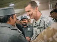  ??  ?? IN CHARGE
General Stanley McChrystal, then commander of U.S. and NATO forces in Afghanista­n, speaks to Afghan military officers in 2009.