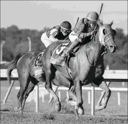  ?? BARBARA D. LIVINGSTON ?? Street Band, with Sophie Doyle up, scores her most important career victory in the Grade 1 Cotillion at Parx last September.