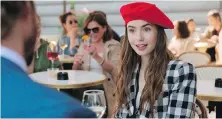  ?? NETFLIX ?? Lily Collins stars in Emily in Paris, a new series from Sex and the City creator Darren Star.