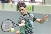  ?? ASSOCIATED PRESS FILE PHOTO ?? Roger Federer has experience­d a resurgence, as evidenced by winning the Australian Open in January.