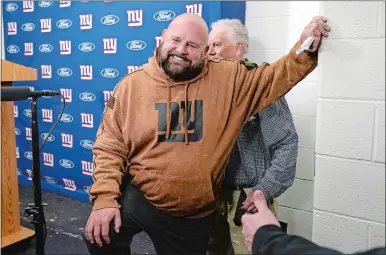  ?? ANDREW HARNIK/AP PHOTO ?? New York Giants head coach Brian Daboll smiles during his news conference following Sunday’s game against the Washington Commanders in Landover, Md. The Giants won 31-19.