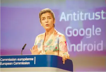  ?? AP FOTO ?? RULING. EU Commission­er Margrethe Vestager holds a press conference on a competitio­n case involving Google Android at the European Commission building in Brussels. The EU’s antitrust chief has fined Google $5 billion for abusing the market dominance of...