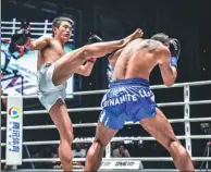  ?? PROVIDED TO CHINA DAILY ?? Han Zihao of Henan lands a kick on Stergos Mikkios during their three-round Muay Thai match during the One Championsh­ip Super Series at Shanghai’s Baoshan Arena on Saturday. Han won a unanimous decision.