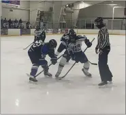  ?? MIKE CABREY/MEDIANEWS GROUP ?? Central Bucks South’s Aidan Gaffney (93) North Penn’s Joseph Silvotti (20) fight for a faceoff during their game on Thursday.