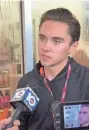  ??  ?? Teen gun control activist David Hogg speaks outside a Publix Supermarke­t in Coral Springs, Florida, on May 25. TERRY SPENCER / AP