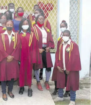  ?? (Photos: Philp Lemonte) ?? Graduates from the latest batch of the Community Training for Empowermen­t Programme (CTEP) pose for a photo op at the Cambridge Community Centre.