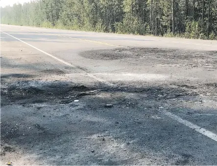  ?? CTV EDMONTON ?? Burn marks on the Icefields Parkway are the only remaining sign of a crash that took six lives near Jasper Tuesday evening.