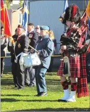  ??  ?? A piper and the Massey-vanier Air Cadets form part of the Remembranc­e Day Parade in Cowansvill­e.