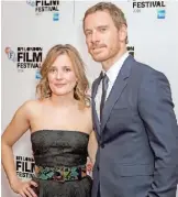 ??  ?? Actors Lyndsey Marshal, left, and Michael Fassbender pose for photograph­ers.