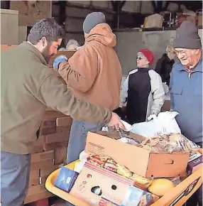  ?? TENNESSEE WILDLIFE FOUNDATION ?? Matt Simcox checks donated venison for the Tennessee Wildlife Federation's Hunters for the Hungry program. (Submitted: Tennessee Wildlife Foundation)