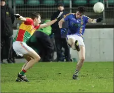  ??  ?? Wicklow’s Conor Healy fires off a shot as Sean Gannon closes in.