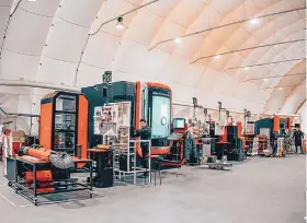  ?? ?? This inside view of Cuby Technologi­es’ turnkey, transporta­ble factory shows some of the proprietar­y machinery and equipment for onsite prefabrica­tion and modular constructi­on of building components.