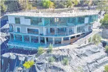  ?? ?? The One overlooks 901 Strada Vecchia Road in Bel Air (above), another ill-fated mansion developed by Gigi and Bella Hadid’s dad, Mohamed (below), which is being razed.