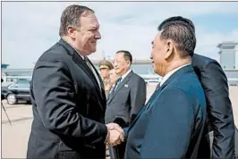  ?? ANDREW HARNIK/GETTY-AFP POOL ?? Secretary of State Mike Pompeo says goodbye to North Korean officials Saturday after denucleari­zation talks — the first follow-up to the June 12 summit — in Pyongyang.