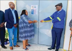 ?? Photo: Contribute­d ?? Feeding the nation… Oshana governor Elia Irimari, trade and industrial­isation minister Lucia Iipumbu, and commercial farmer Richard Kamwi at the official opening of Vuche Vuche maize meal store at Oshakati.
