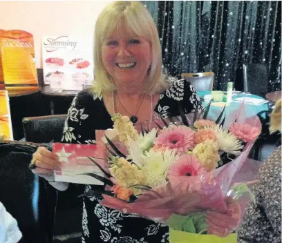  ??  ?? Departing
Slimming World consultant Mari Guthrie said a sad farewell to the Burnside group