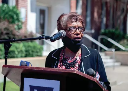  ?? ARIEL COBBERT/THE COMMERCIAL APPEAL ?? Bertha Looney, one of the Memphis State 8, addresses the crowd during the University of Memphis Unity Walk from South Campus in Memphis on June 14. The event was held in reaction to the death of George Floyd, an unarmed black man who died in Minneapoli­s on Memorial Day.