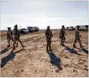  ?? PHOTOS BY NASSER NASSER / ASSOCIATED PRESS ?? U.S. Army commanders toured Sunday the operations of the Iraqi army Seventh Brigade at the Ain al-Asad base in Anbar, Iraq — which hosts U.S. forces — following a series of attacks.