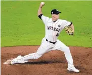  ?? ERIC GAY/ASSOCIATED PRESS ?? Houston’s Brad Peacock threw 3⅔ innings of scoreless relief to help the Astros beat the Dodgers in Game 3 of the World Series Friday in Houston.