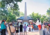  ?? EDDIE MOORE/JOURNAL ?? An estimated 400 people attended a rally Thursday in support of removing the obelisk that stands at the center of Santa Fe’s historic Plaza.