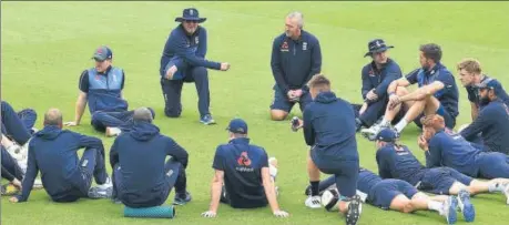  ?? AFP ?? England captain Eoin Morgan (second left, top row) and coach Trevor Bayliss have moulded the team to be a force to reckon with in Champions Trophy.