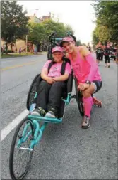  ??  ?? Shaun Evans and his son, Shamuss of Galway take a break while participat­ing in the 2017Sarato­ga Palio: Melanie Merola O’Donnell Memorial Race on Sunday morning in Saratoga Springs.