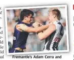  ?? Picture: Getty ?? Fremantle’s Adam Cerra and Jordan De Goey of the Magpies wrestle yesterday