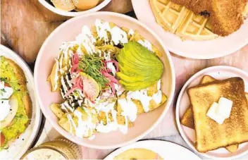  ?? SUNDAY BREAKFAST SOCIETY ?? Popular menu items at Sunday Breakfast Society include ‘birriaquil­es’ made with the Jalisco-style birria.