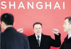  ?? DING TING / XINHUA VIA THE ASSOCIATED PRESS FILES ?? Tesla CEO Elon Musk attends the groundbrea­king of the company’s Shanghai factory in January.