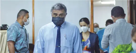  ?? Photo: Leon Lord ?? Permanent Secretary for Health and Medical Services Dr James Fong with Head of Health Protection Dr Aalisha Sahukhan following behind on May 7, 2021.