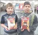  ??  ?? Ten-year- old Alika Hoomana (left) and his
12-year- old brother Ikaika
Hoomana recently received Avatar comic books
at the M.R. Dye Public Library’s annual Comic Book Giveaway in
Horn Lake.