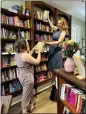  ?? AUSTIN CARTER — POCKET BOOKS VIA AP ?? Owners Jessica Callahan, left, and Julie Ross appear at their bookstore Pocket Books Shop in Lancaster, Pa., May 21.