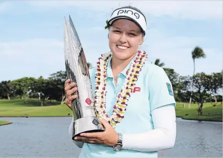  ?? HARRY HOW GETTY IMAGES ?? Brooke Henderson spoke to the media after her win about the significan­ce to Canadians of the death of 16 people when a hockey team’s bus was hit.