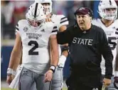  ?? AP FILE ?? Longtime college football coach Mike Leach, known for his prolific Air Raid offense, died Monday following complicati­ons from a heart condition. He was 61.