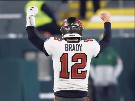  ?? Jeffrey Phelps / Associated Press ?? Buccaneers quarterbac­k Tom Brady reacts after winning the NFC championsh­ip game against the Packers on Sunday.